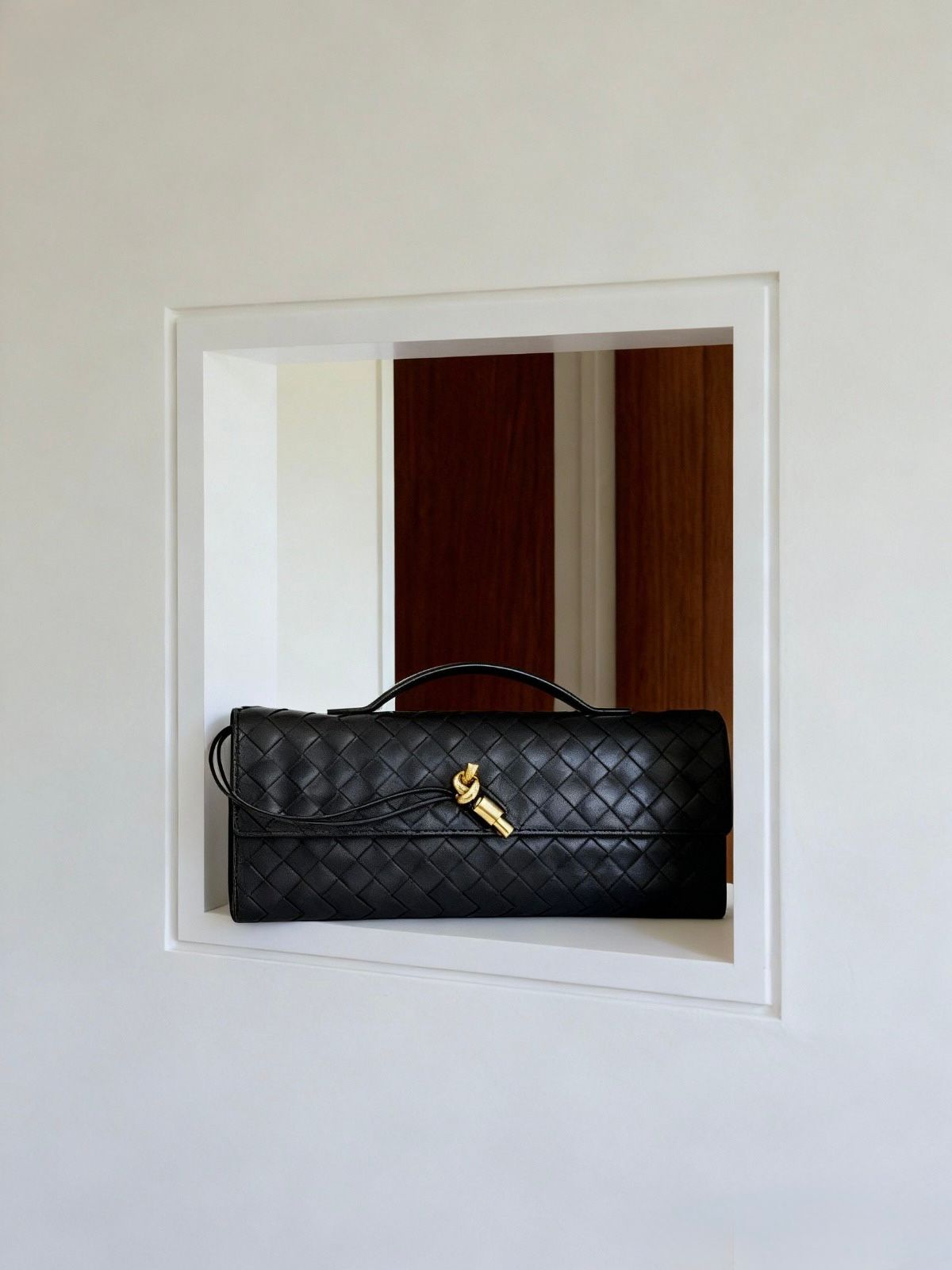 Clutch Andiamo de piel entretejido